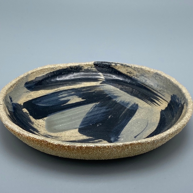 Black and gray painted plate
