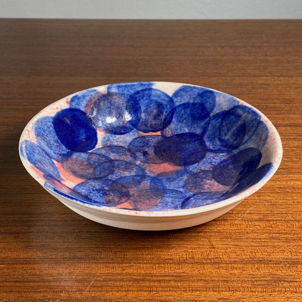 Blue and orange dotted bowl