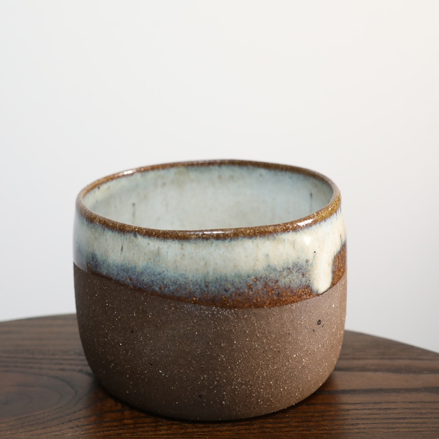 Vulcan clay cylinder with peach glaze