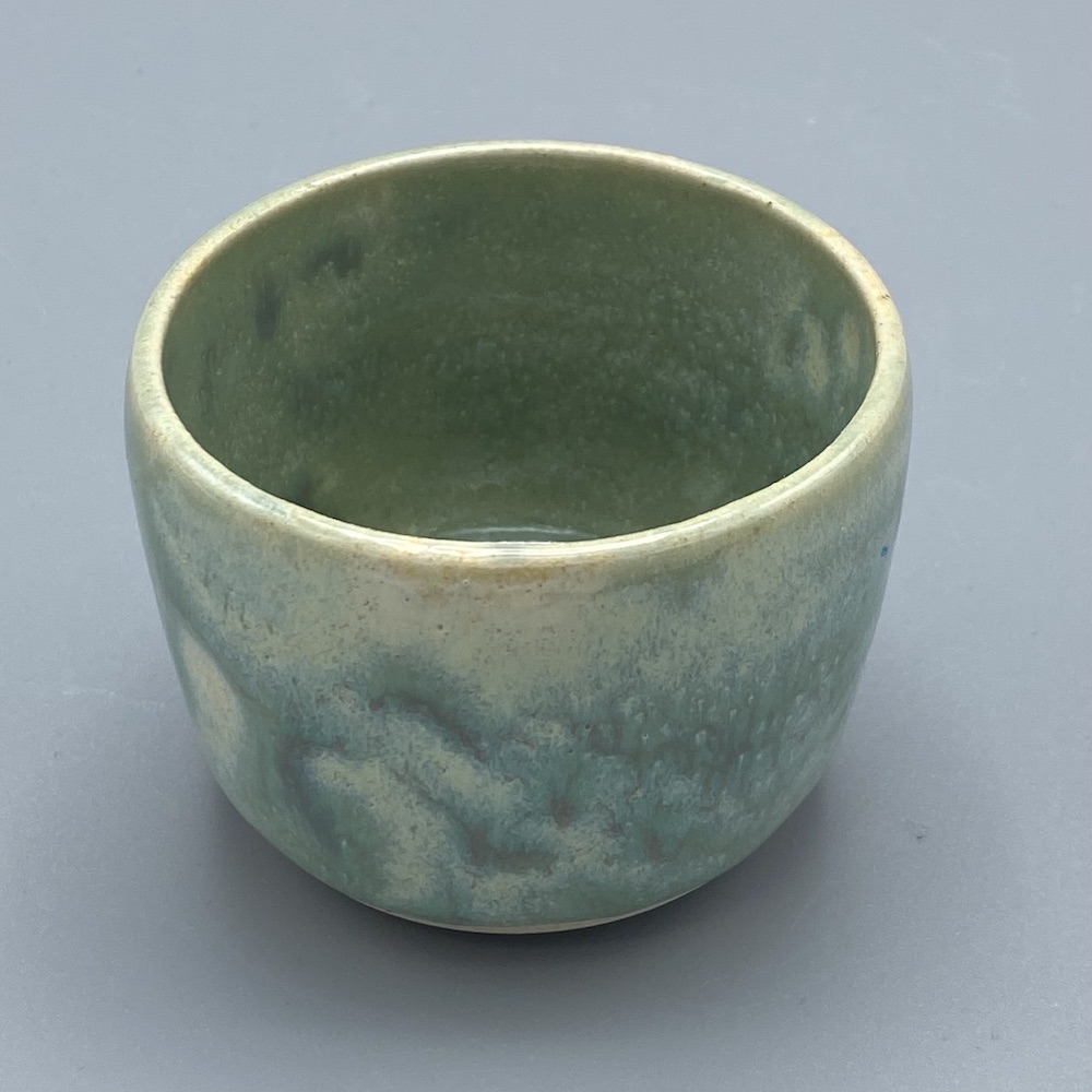 Tiny peach celadon cup