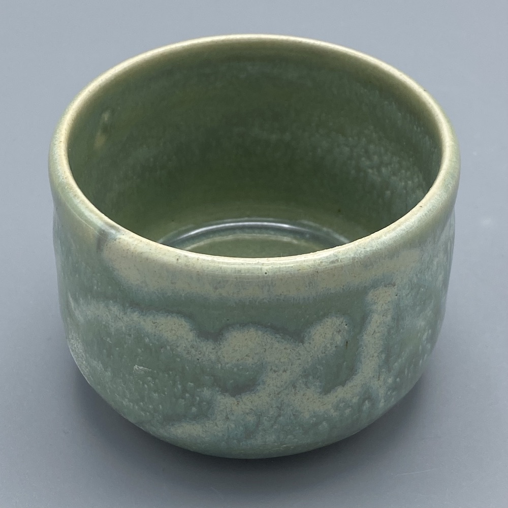 Tiny peach celadon cup