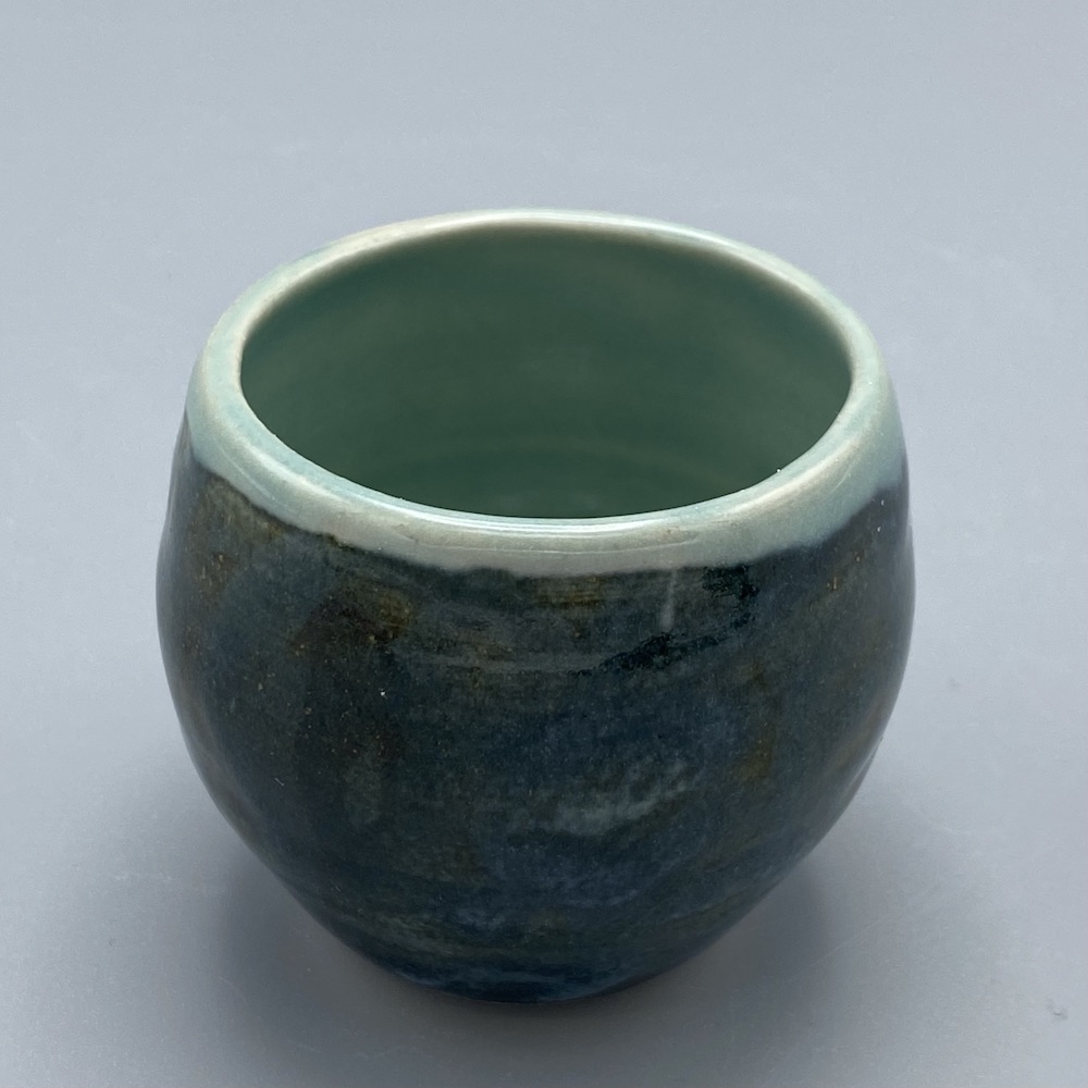 Tiny tenmoku celadon cup