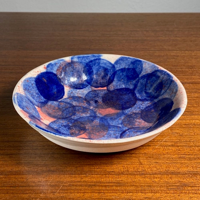 Blue and orange dotted bowl