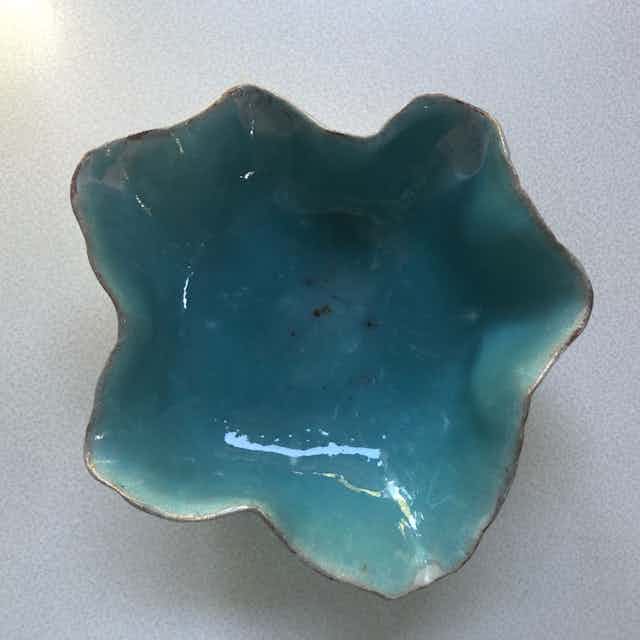 Hand-built bowl with celadon and white glaze