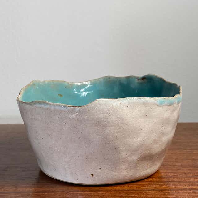 Hand-built bowl with celadon and white glaze