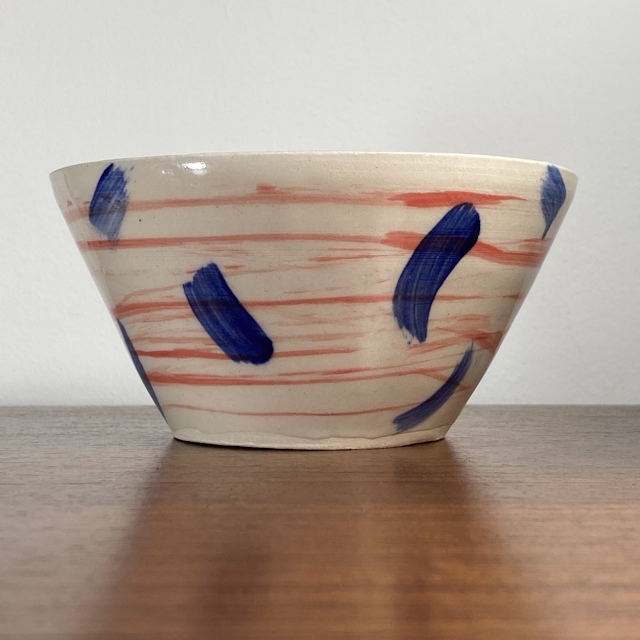 Colourful bowl with interior and exterior decoration