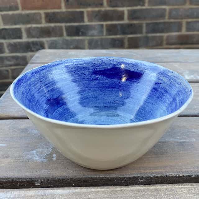 White bowl with inner pencil decoration
