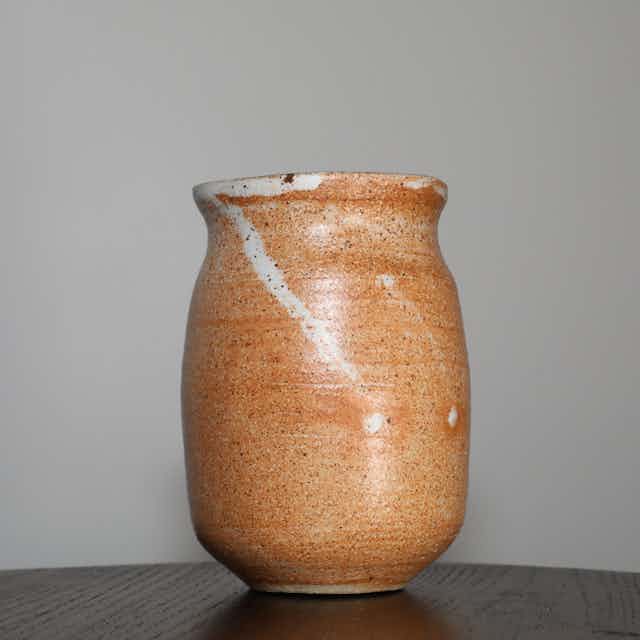 Small orange vase