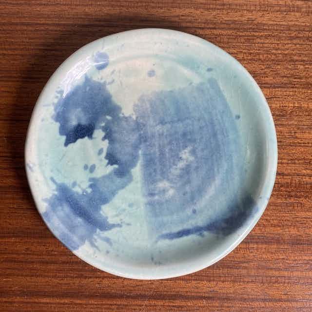 Small painted blue plate