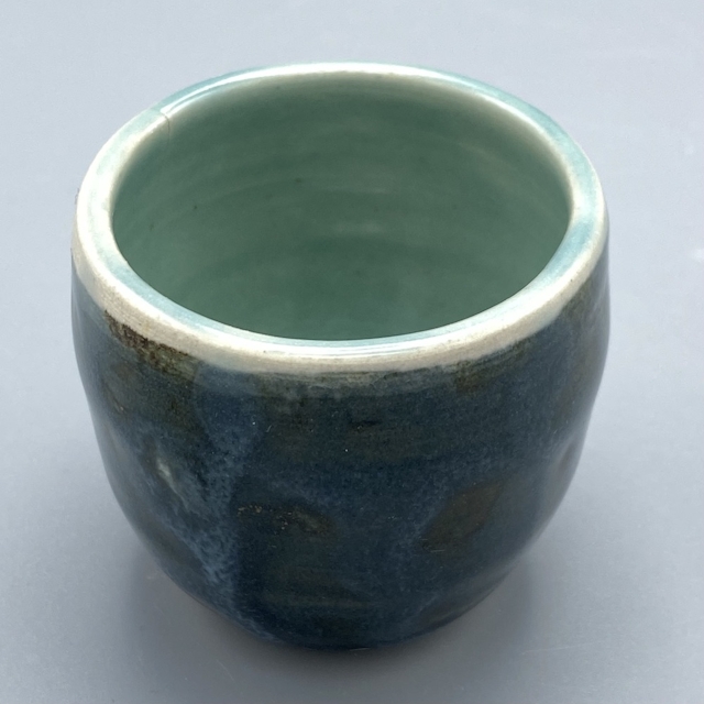 Tiny tenmoku celadon cup